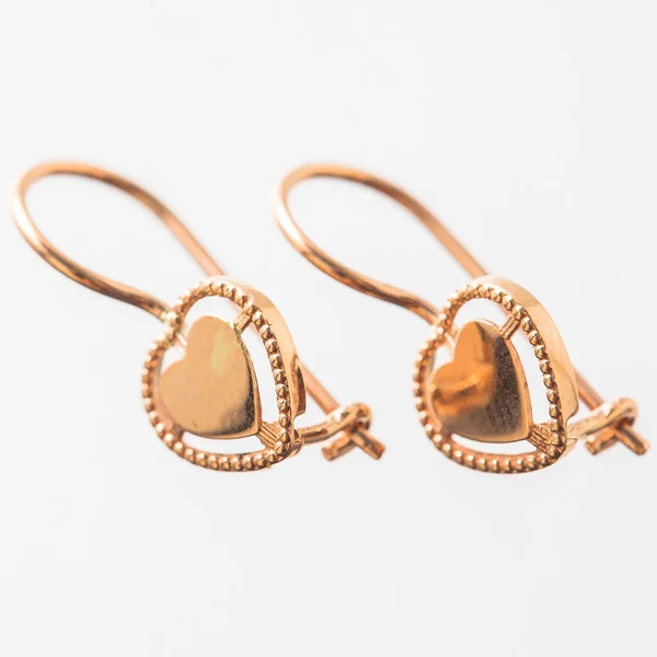 Paire Boucles Oreilles Dorées Isolées Sur Fond Blanc — Photo