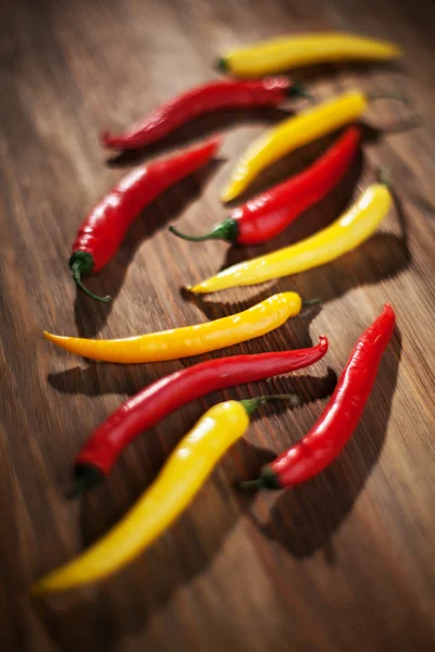Red and yellow chili peppers — Stock Photo, Image