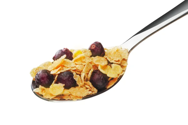 Cornflakes with fruits on the spoon — Stock Photo, Image