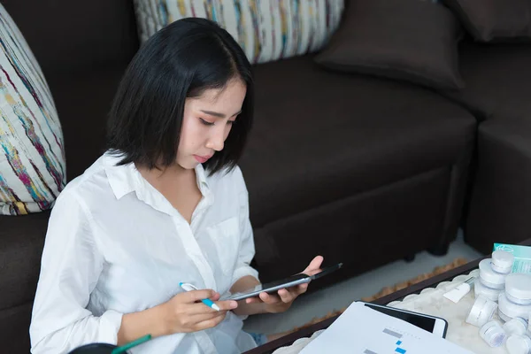 Beautiful asian woman working at home,Prepare present for boss at the company,Thailand people work from home concept