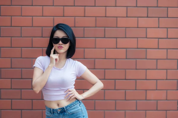 Portrait Hipster Girl Brick Wall Background Beautiful Asian Woman Pose — Stockfoto