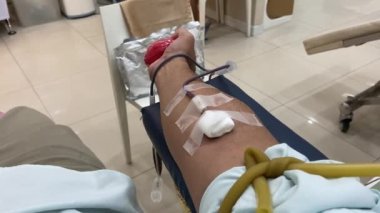 Blood drive concept, Asian handsome man donate blood for human