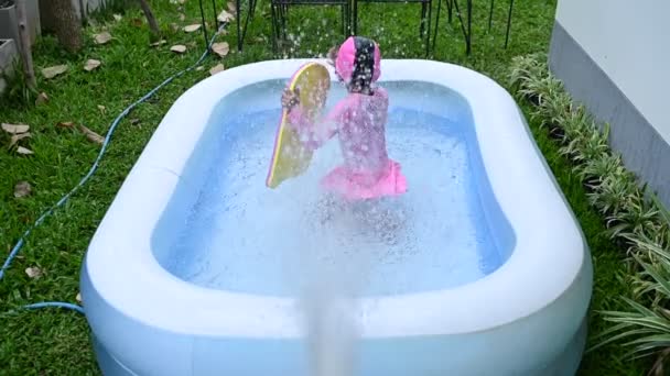 Asian Little Girl Swimming Inflatable Pool Home Fun — Video