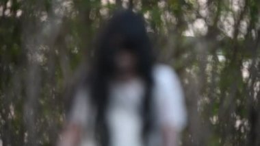 Portrait of asian woman make up ghost face at the swamp, Horror in water scene, Scary at river, Halloween poster, Thailand people