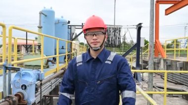 Water plant maintenance technician, mechanical engineer check the control system at the water treatment plant