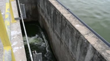 Water plant maintenance technician, mechanical engineer check the control system at the water treatment plant