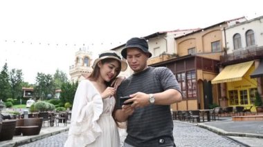 Happy Young asian couple travel at old town Italy style, Honeymoon couple after marriage, Toursit concept