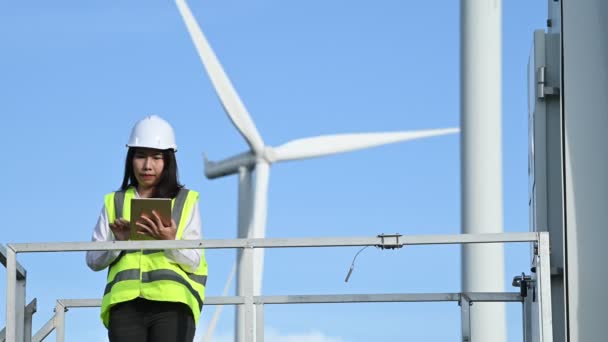 Woman Engineer Working Holding Report Wind Turbine Farm Power Generator — Stock Video