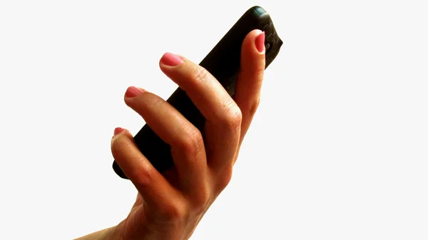 The hand holding the phone — Stock Photo, Image