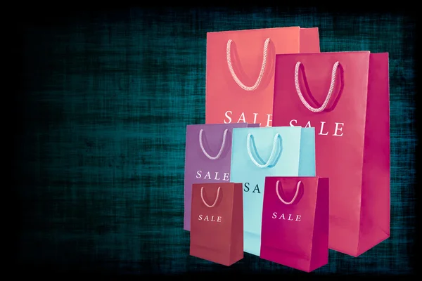 Shopping sale bags on grange background. — Stock Photo, Image