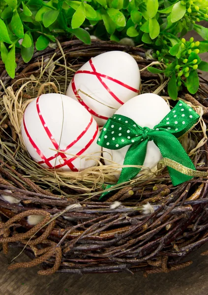 Easter eggs in nest. — Stock Photo, Image