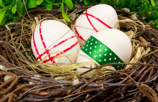 Easter eggs in nest. — Stock Photo, Image