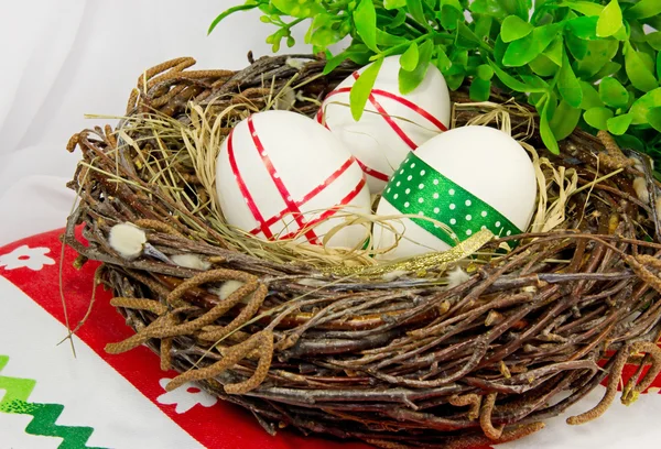 Easter eggs in nest. — Stock Photo, Image