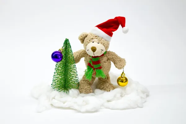Bear dresses up Christmas tree. number 3 — Stock Photo, Image