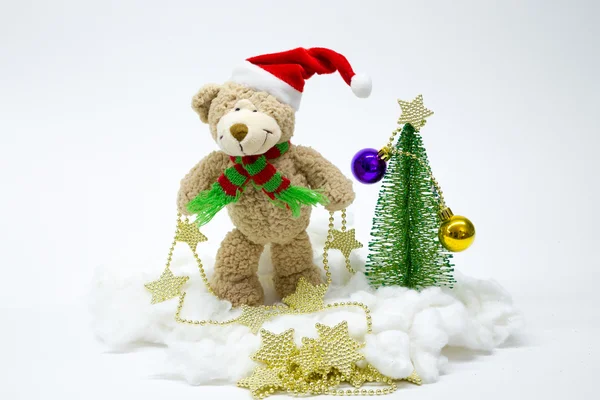 Bear dresses up Christmas tree. number 4 — Stock Photo, Image