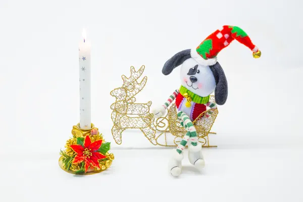 Candle dog sled new year — Stock Photo, Image