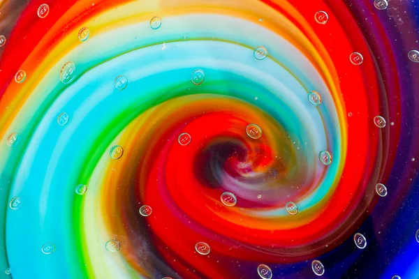 Glastropfen und farbige Spirale — Stockfoto