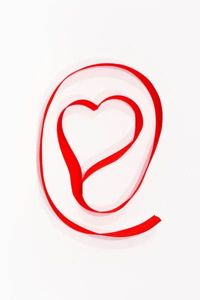 Heart from red ribbon — Stock Photo, Image