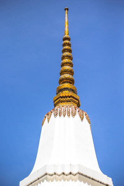 Ancient pagoda on blue sky in temple, Thailand