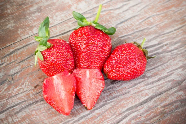 Fresh strawberries on wood background — Stock Photo, Image