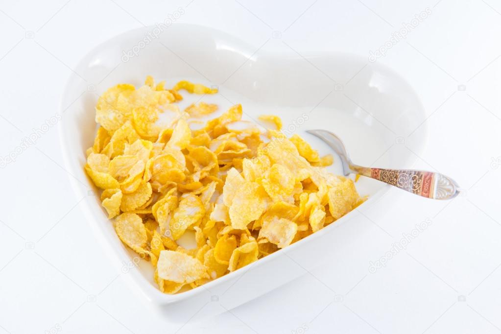 A bowl of nutritious and delicious corn flake cereal with milk