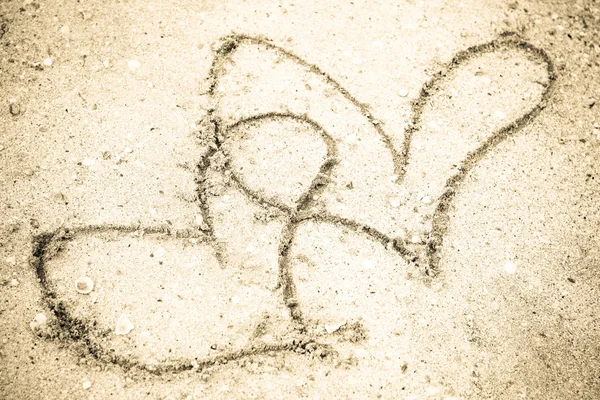 Two Hearts on sand — Stock Photo, Image