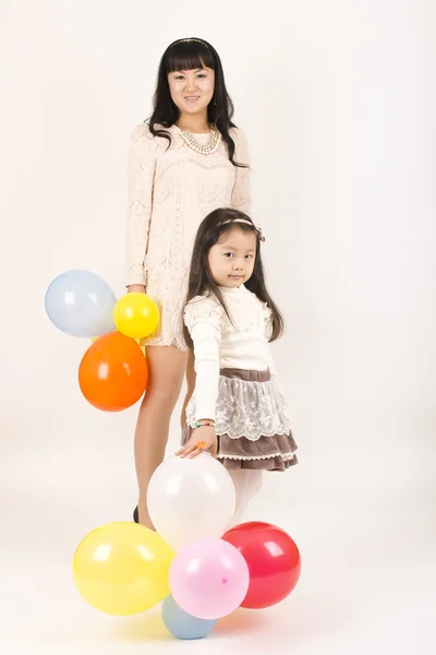 Asya görünümü ve kızı genç kadın.