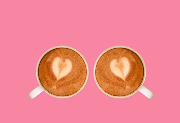Ζευγάρι Της Καρδιάς Σχήμα Latte Art Cappuccino Καφέ Απομονώνονται Ροζ — Φωτογραφία Αρχείου