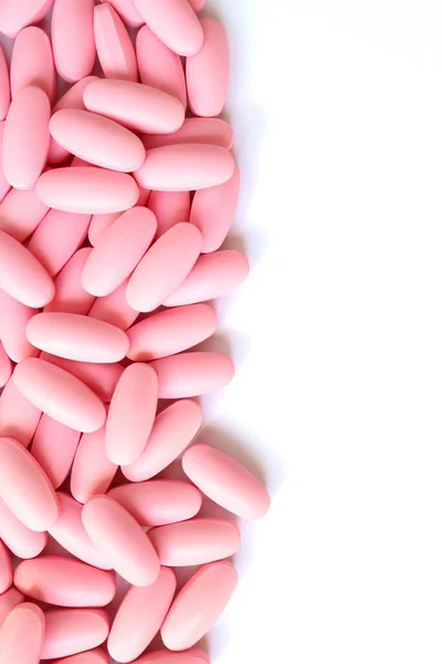 Bovenaanzicht Van Hoop Roze Pillen Witte Achtergrond Met Kopieerruimte — Stockfoto