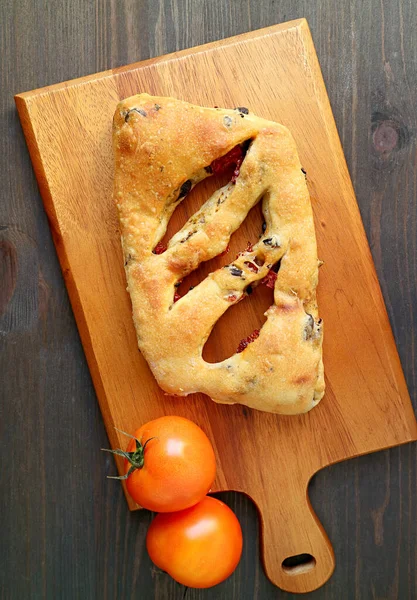 Top View Sun Dried Tomato Olive Fougasse French Bread Wooden — Stock Photo, Image
