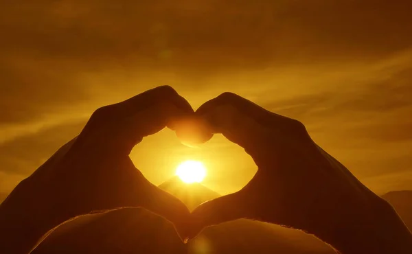 Silhouette Hand Making Heart Sign Bright Sun Rising Silhouette Mountain — Stok fotoğraf