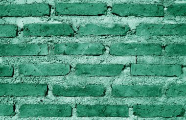 Front View of Jungle Green Colored Grunge Brick Wall for Abstract Backdrop