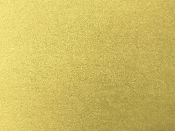 Sarı altın renkli kağıt dokusu. Metnin için yer