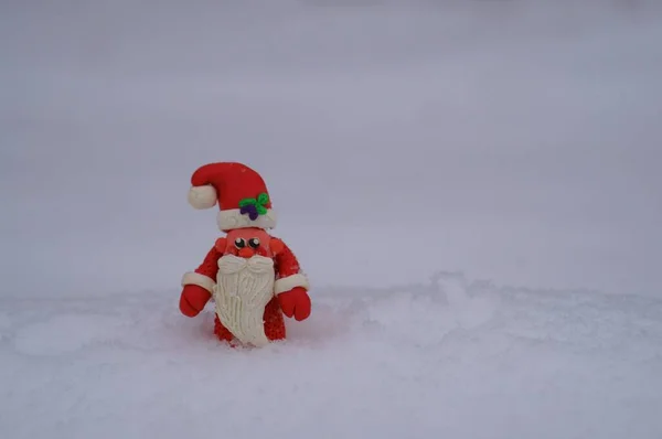 Toy Santa Claus Made Plasticine Background Snow — Stock Photo, Image