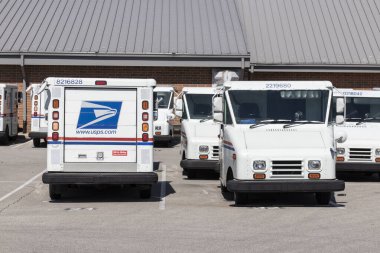 Carmel - Circa May 2021: USPS Post Office Mail Trucks. The Post Office is responsible for providing mail delivery. clipart