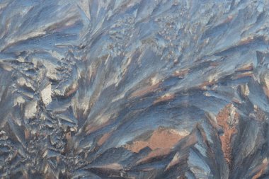 Ice Crystals on Glass. Abstract Ice design for background.