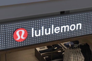 Indianapolis - Circa December 2021: Lululemon Athletica retail mall location. Lululemon Athletica offers yoga and athletic apparel to men and women. clipart