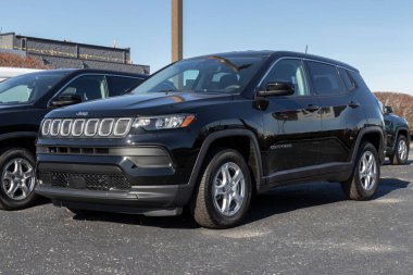Indianapolis - Circa January 2022: Jeep Compass display at a Chrysler dealership. The Stellantis subsidiaries of FCA are Chrysler, Dodge, Jeep, and Ram.