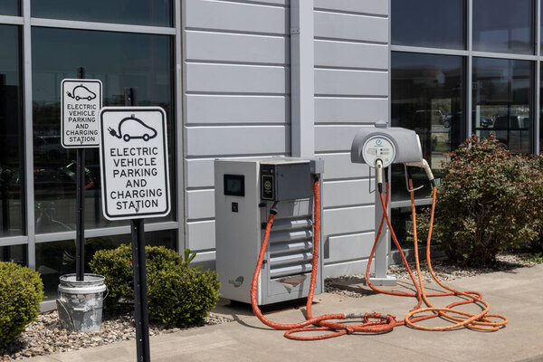 Fishers - Circa May 2022: Electric Vehicle Quick Charger at a Nissan dealership. Nissan offers the Leaf and Ariya EV Electric vehicles.