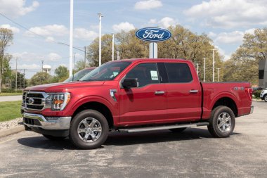 Elkhart - Circa May 2022: Ford F-150 display at a dealership. The Ford F150 is available in XL, XLT, Lariat, King Ranch, Platinum, and Limited models.