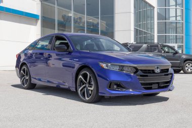 Kokomo - Circa May 2022: Honda Accord Hybrid display at a dealership. The Honda Accord is one of the top 25 cars sold in the US every year.