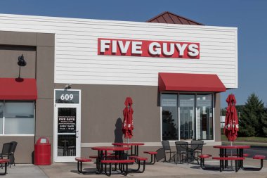 Harrison - Circa July 2022: Five Guys burgers and fries restaurant. Five Guys is a fast casual restaurant chain that offers peanuts in the shell.