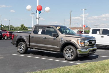 Harrison - Circa July 2022: Used Ford F-150 display at a dealership. With supply issues, Ford is relying on preowned car sales to meet demand.