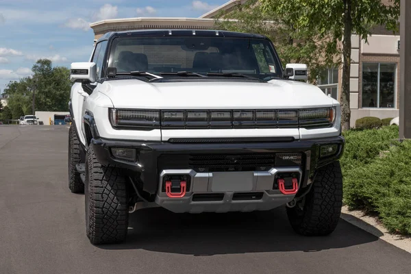 Carmel - Circa July 2022: GMC Hummer EV Sport Utility Truck display. The GMC Hummer EV is offered in EV2, EV2x, and EV3x models. 