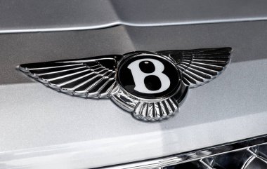 Indianapolis - Circa July 2022: Bentley logo in a stacked exposure. Bentley Motors is a British manufacturer of luxury cars and SUVs and a subsidiary of Volkswagen.