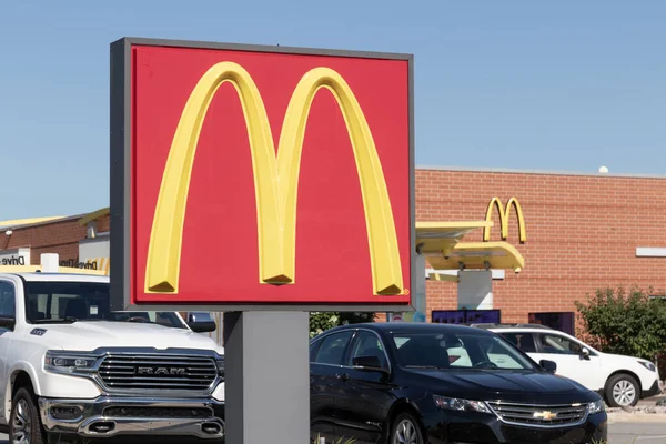 Merrillville - Circa July 2022: McDonald's Restaurant. McDonald's is offering employees higher hourly wages, paid time off, and tuition payments.