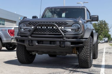Indianapolis - Circa August 2022: Ford Bronco display. Broncos are offered in a base model or Ford has up to 200 accessories for street and off-road use.