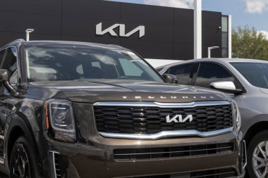 Indianapolis - Circa August 2022: Kia Telluride display at a dealership. Kia offers the Telluride in LX, S, EX and SX models. clipart