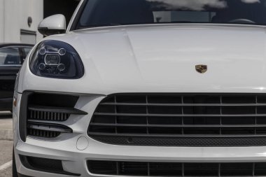 Indianapolis - Circa August 2022: Porsche Cayenne display at a dealership. Porsche offers the Cayenne in Base, Platinum, GTS and Turbo models.