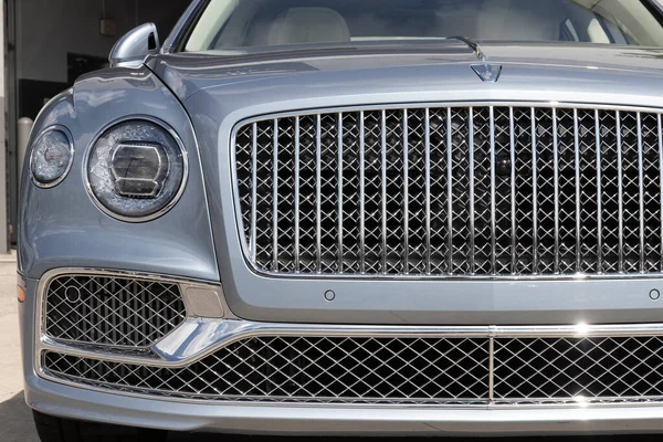 Indianapolis - Circa August 2022: Bentley Flying Spur display at a dealership. Bentley Motors is a British manufacturer of luxury cars and SUVs.